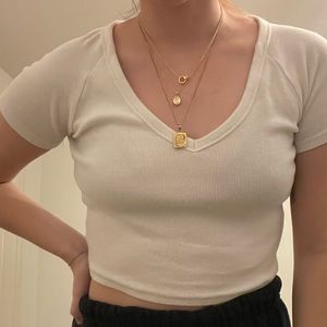 garage white v neck crop top